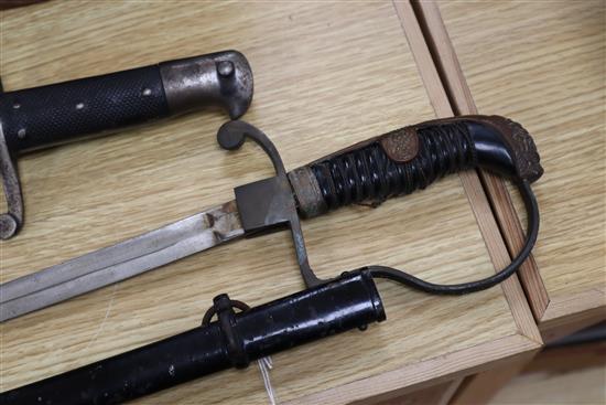 A bayonet and a Naval sword